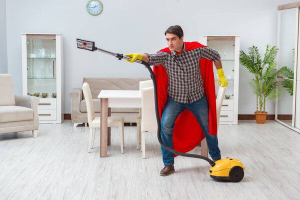 Super hero cleaner working at home