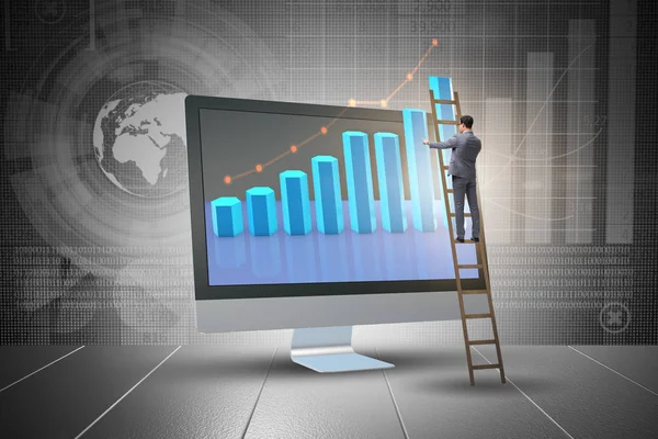 Grafiklerle ekonomi tahmini konseptinde iş adamı