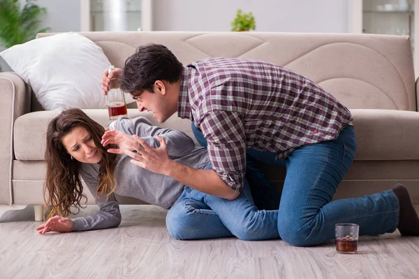 Domestic violence concept in a family argument with drunk alcoho — Stock Photo, Image