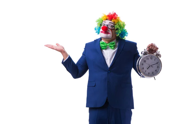 Lustige Clown Geschäftsmann mit einem Wecker isoliert auf weißen ba — Stockfoto