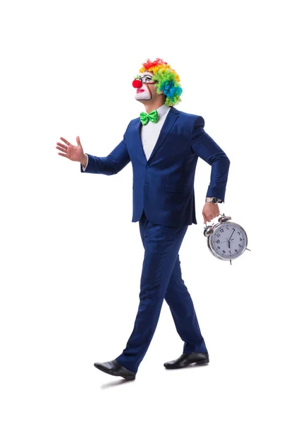 Homme d'affaires clown drôle avec un réveil isolé sur ba blanc — Photo