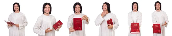 Joven sacerdote con Biblia aislada en blanco —  Fotos de Stock