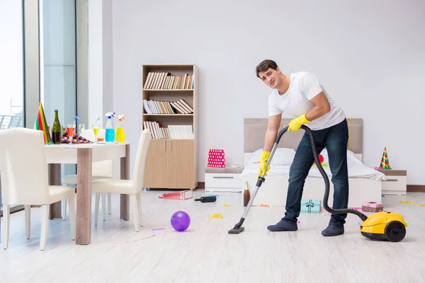 Young man after the wild Christmas party — Stock Photo, Image