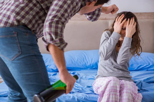 Domestic violence concept in a family argument with drunk alcoho — Stock Photo, Image