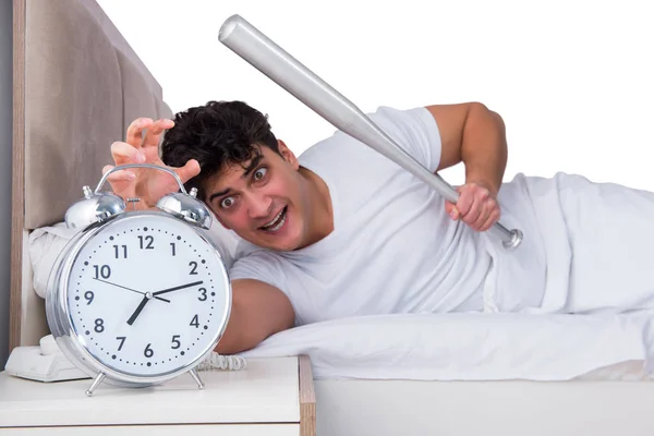 Man in bed suffering from insomnia