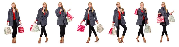 Woman with shopping bags isolated on white — Stock Photo, Image