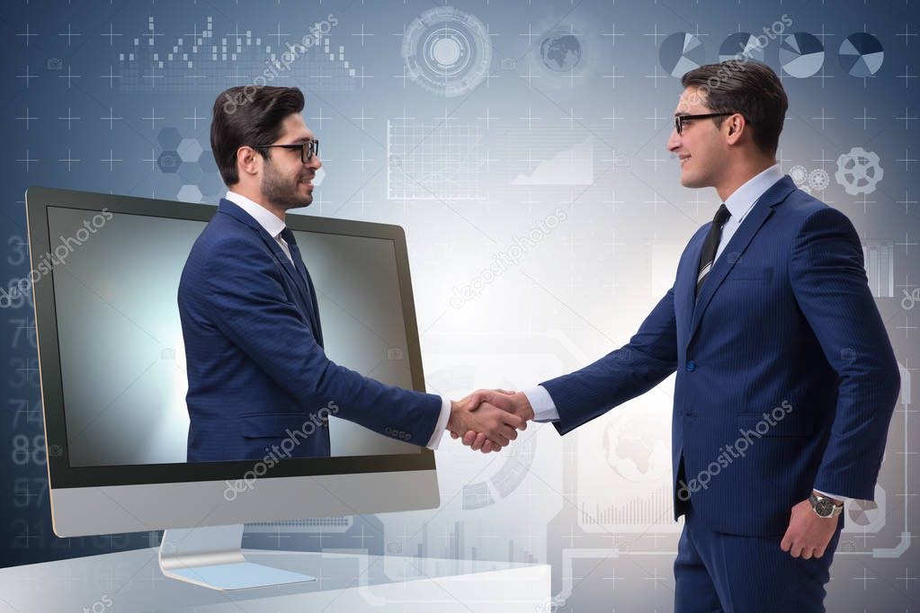 Telepresence concept with two businessman handshaking