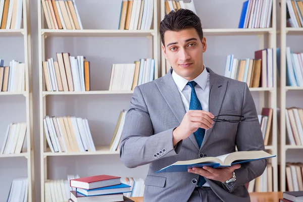 Business law student working studying in the library