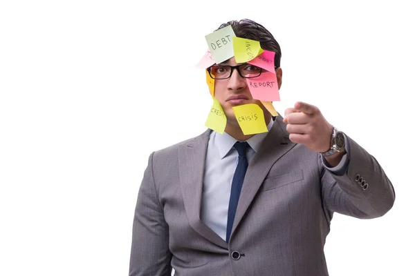 Empresário com muitos lembretes isolados em branco — Fotografia de Stock