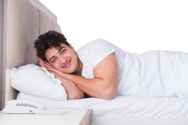 Man in bed suffering from insomnia