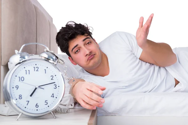 Man in bed suffering from insomnia