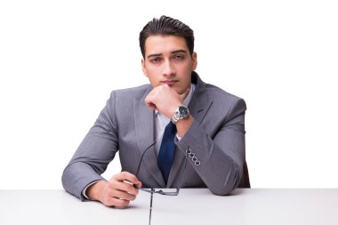 Genç işadamı beyaz arka planda izole edilmiş