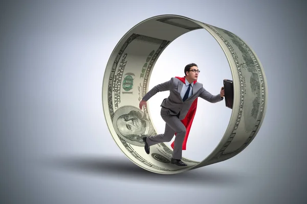 Businessman in hamster wheel chasing dollars — Stock Photo, Image