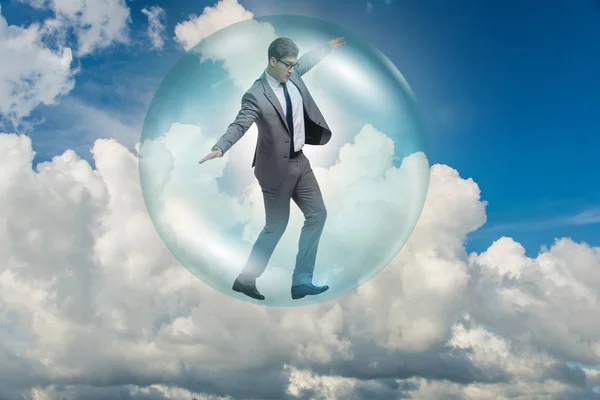 Podnikatel létající uvnitř bubliny — Stock fotografie