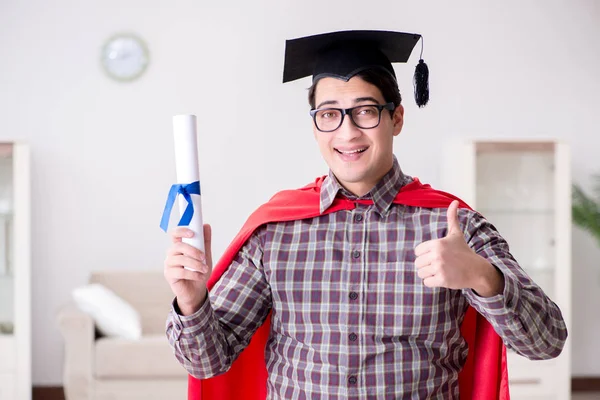 Super hero student graduating wearing mortar board cap