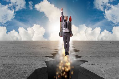 İş adamı roketle kaya boşluğundan uçuyor