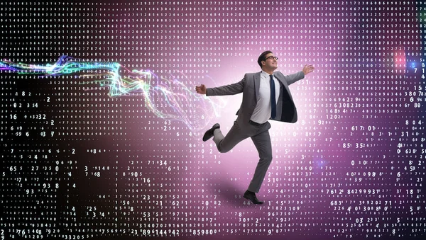 Businessman running towards digital achievements — Stock Photo, Image