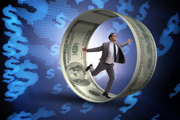 Hamster çarklı bir iş adamı dolarları kovalıyor.