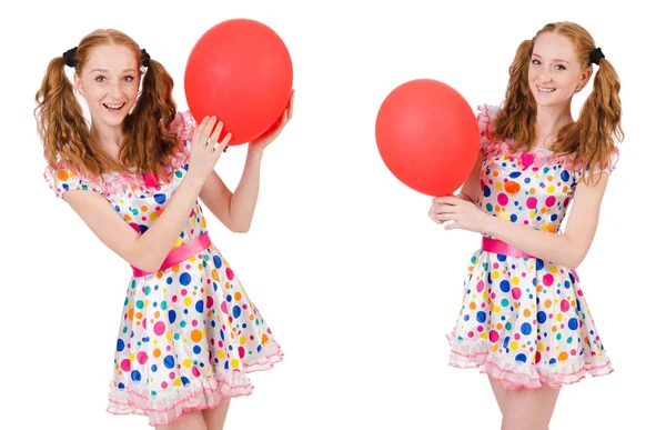 Jonge vrouw met rode ballon geïsoleerd op wit — Stockfoto