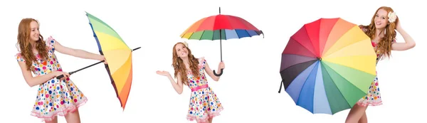 Junges Mädchen mit buntem Regenschirm — Stockfoto