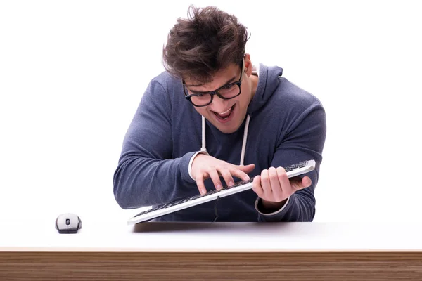 Engraçado nerd homem trabalhando no computador isolado no branco — Fotografia de Stock