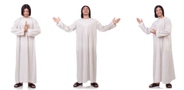 Genç rahip İncil üzerine beyaz izole ile