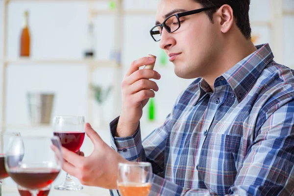 Professional sommelier tasting red wine — Stock Photo, Image