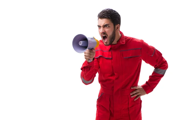 Young repairman with a megaphone bullhorn isolated on white back — Stock Photo, Image