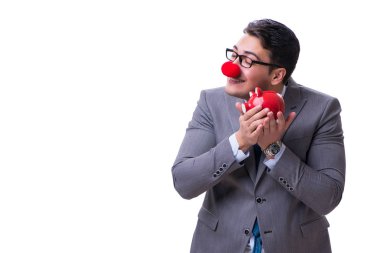 Komik palyaço işadamı ile beyaz arkasında izole bir kumbara