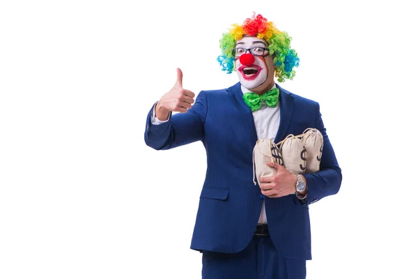 Buffo clown uomo d'affari con soldi sacchi borse isolato su bianco — Foto Stock