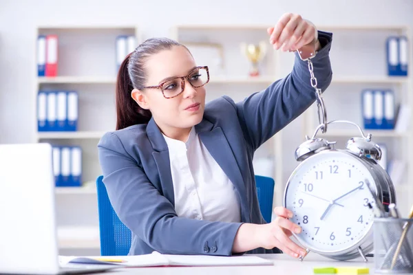 Businesswoman in time management concept — Stock Photo, Image