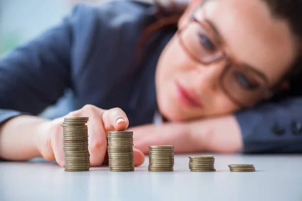 Businesswoman with coins in forex concept — Stock Photo, Image