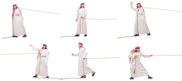 Arab i dragkamp koncept på vit — Stockfoto