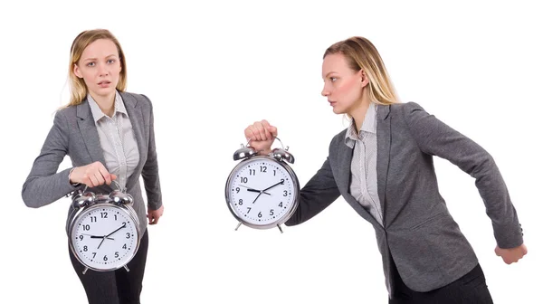 Businesswoman in gray suit holding alarm clock isolated on white — Stock Photo, Image