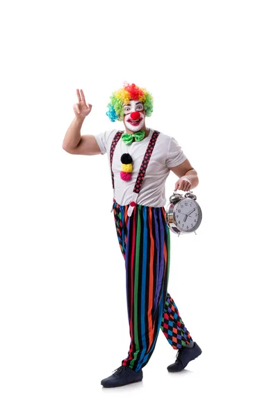 Lustiger Clown mit Wecker auf weißem Hintergrund — Stockfoto