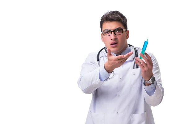 Молодой врач-мужчина со шприцем на белом фоне — стоковое фото