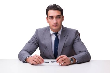 Genç işadamı beyaz arka planda izole edilmiş