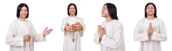 Jonge priester met Bijbel geïsoleerd op wit — Stockfoto