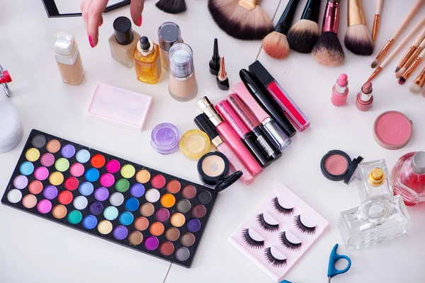 Collection of make up products displayed on the table