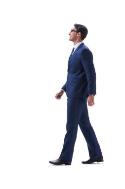 İşadamı yürüme ayakta yan görüntülemek izole üzerinde beyaz backgro