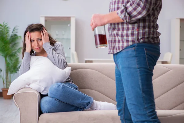 Domestic violence concept in a family argument with drunk alcoho — Stock Photo, Image