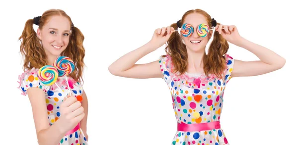 Roodharige meisje met lolipops geïsoleerd op wit — Stockfoto