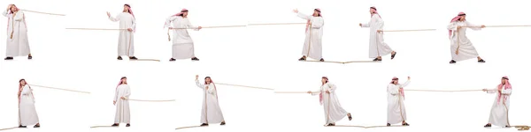Arab i dragkamp koncept på vit — Stockfoto
