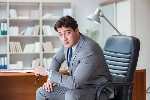 Young businessman working in the office