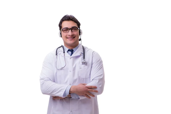 Médico jovem com fone de ouvido isolado em branco — Fotografia de Stock