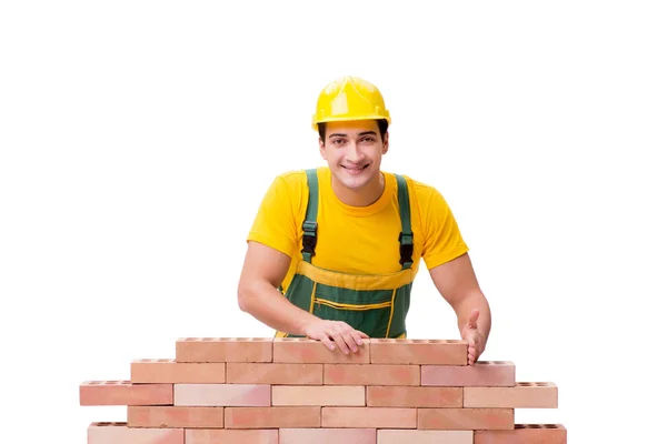 The handsome construction worker building brick wall — Stock Photo, Image