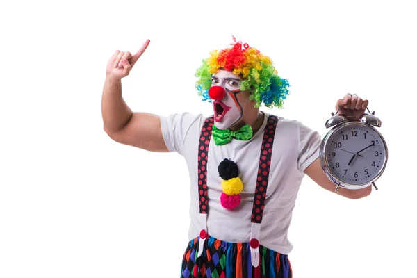 Lustiger Clown mit Wecker auf weißem Hintergrund — Stockfoto