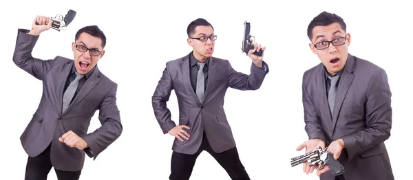 Vtipný obchodník s pistolí na bílém — Stock fotografie