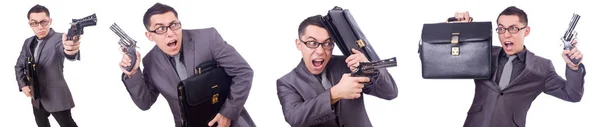 Забавный бизнесмен с пистолетом на белом — стоковое фото