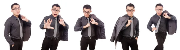 Jeune homme en costume gris isolé sur blanc — Photo